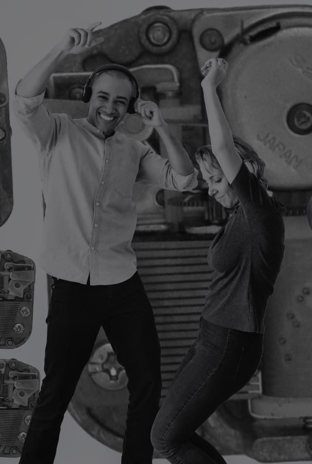 People jamming to antique music boxes